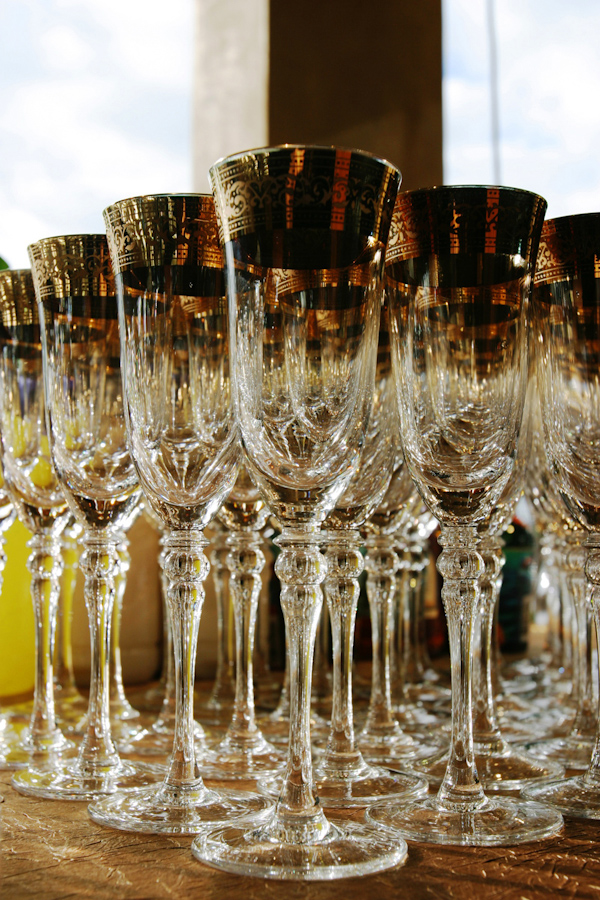 gold glass wedding champagne flutes photo by Yvette Roman Photography 